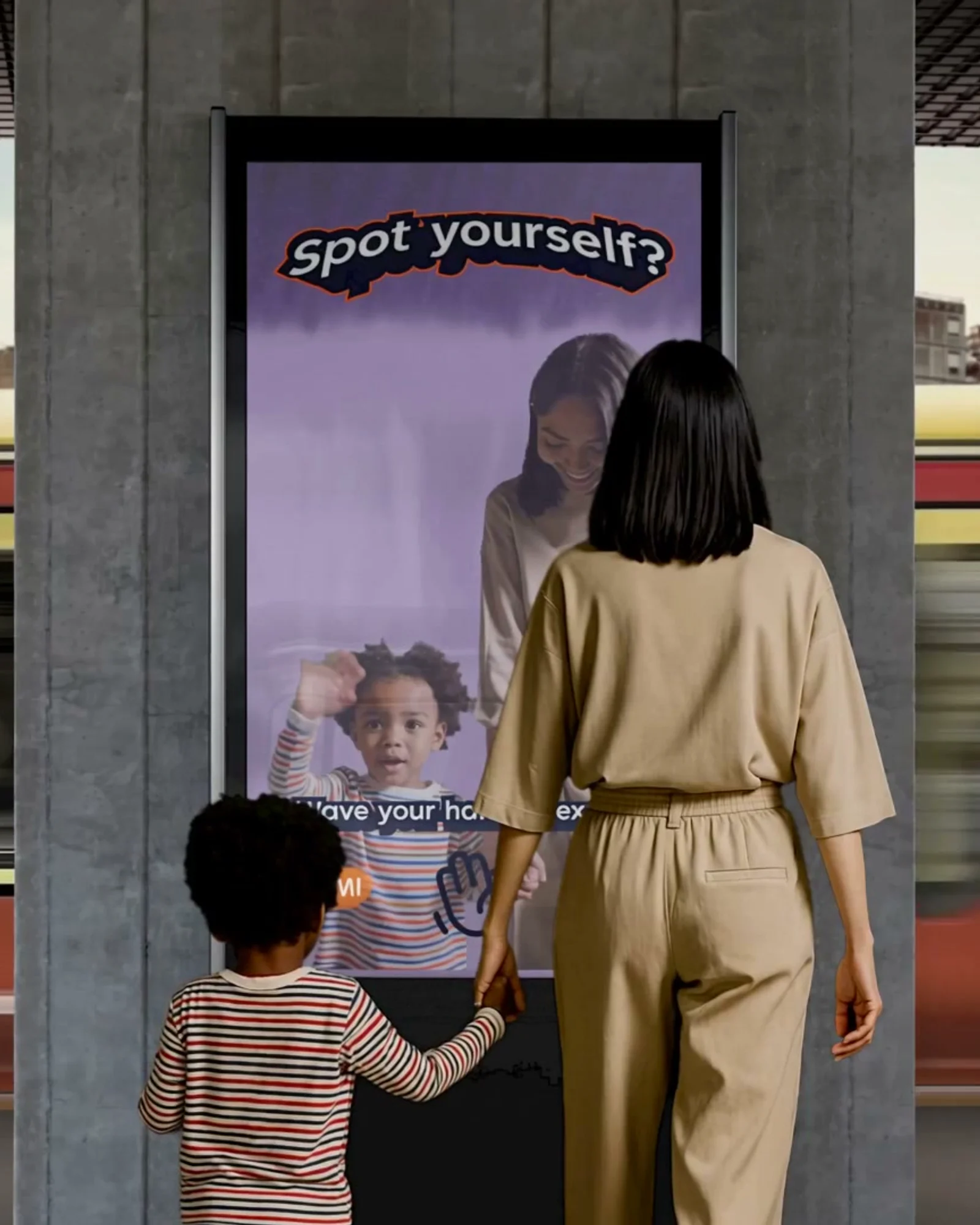 Mother and child facing a digital kiosk that asks Spot yourself? at a station platform